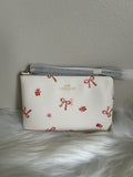 NWT Coach Corner Zip Wristlet With Bow Print