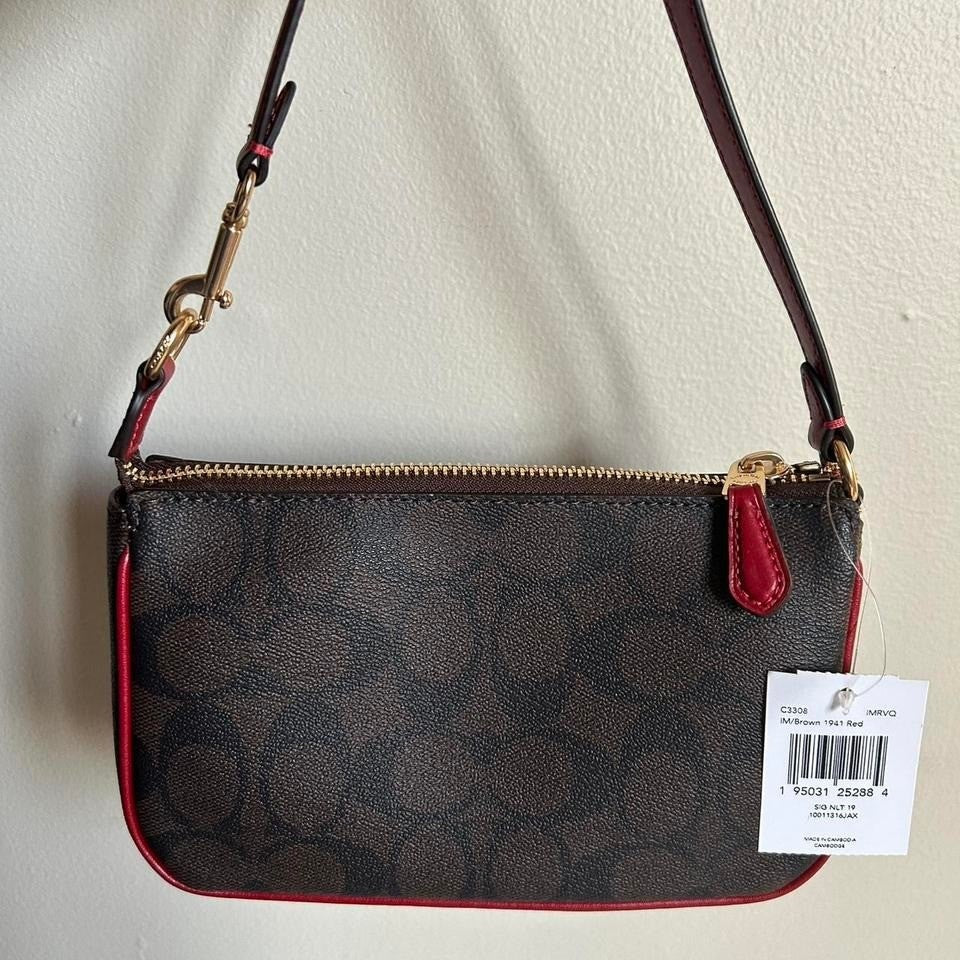 Coach Nolita 19 Brown Red Signature Canvas Leather Wristlet NEW