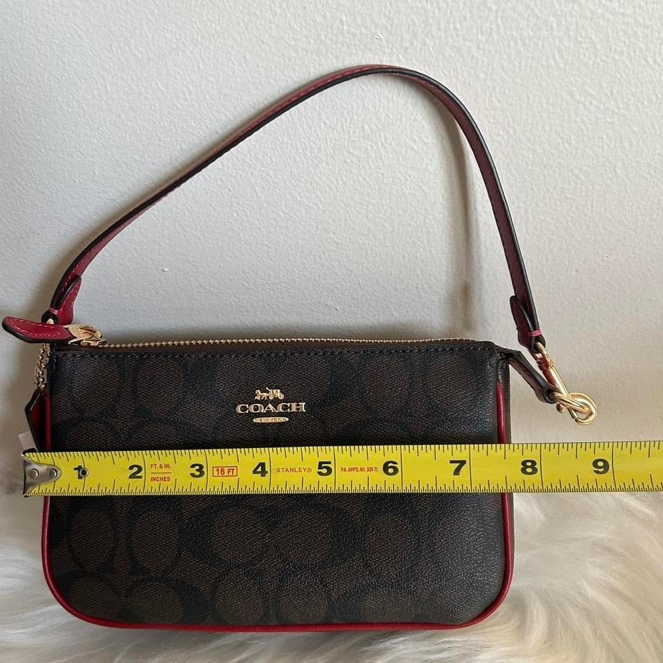 Coach Nolita 19 Brown Red Signature Canvas Leather Wristlet NEW