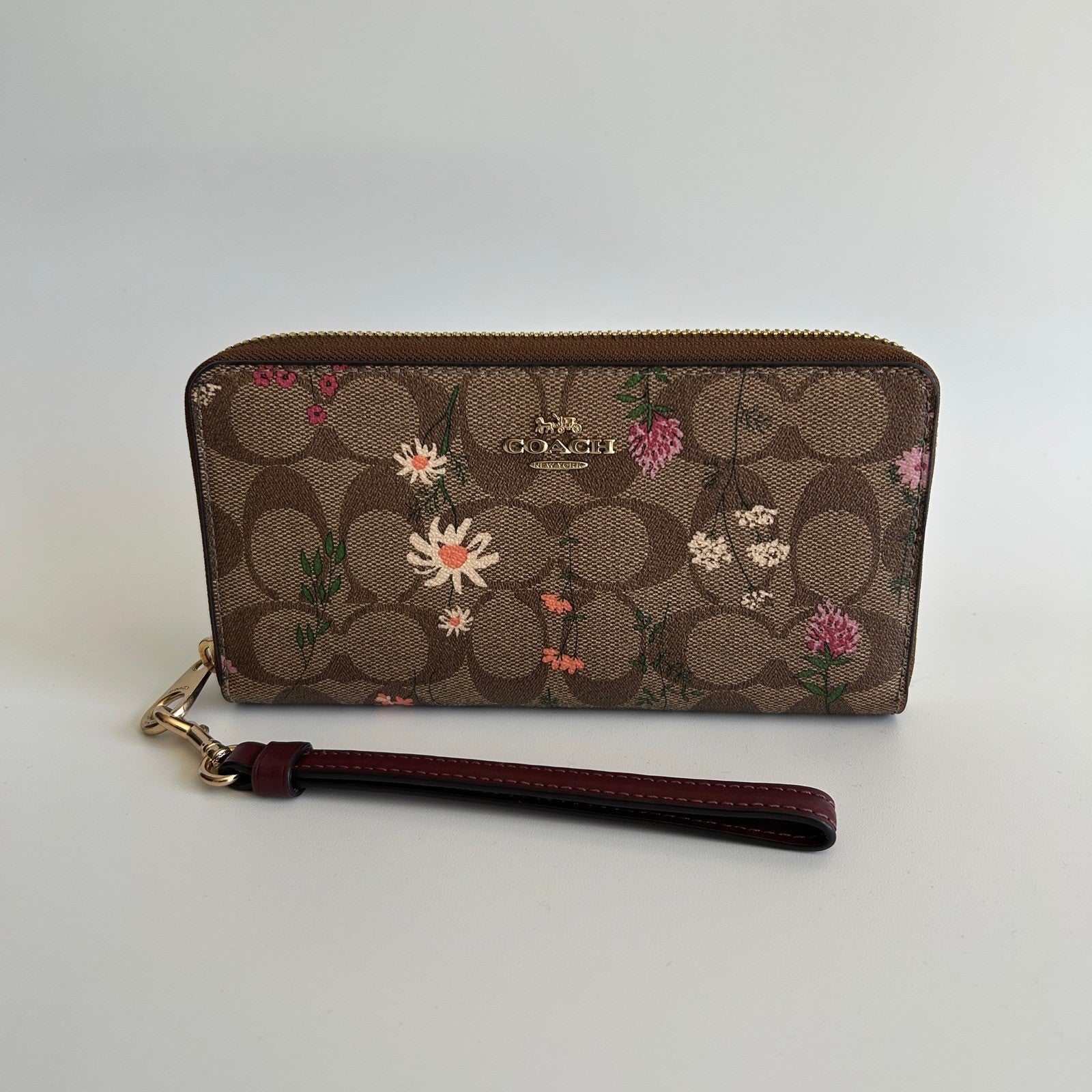 Coach Accordion Wildflower Tan Signature Canvas Wristlet Wallet Excellent
