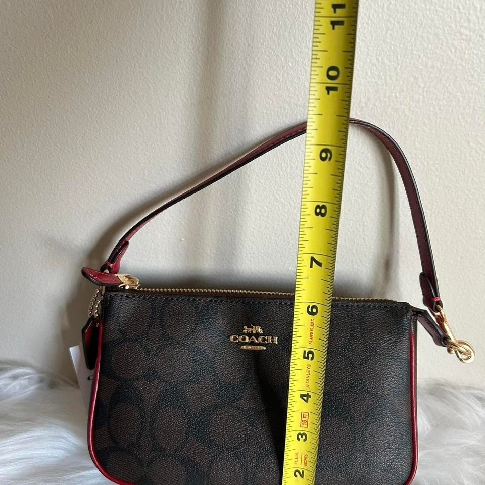 Coach Nolita 19 Brown Red Signature Canvas Leather Wristlet NEW