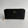Coach Long Zip Around Black Signature Embossed Leather Wallet CEW21