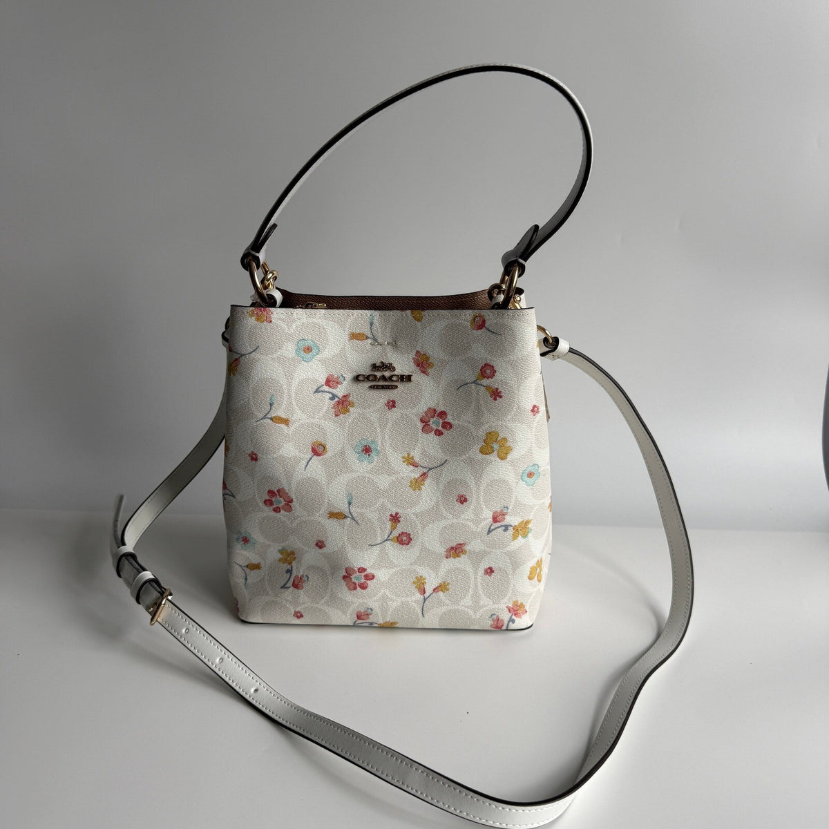 Coach Small Town Bucket Bag White Signature Canvas Mystical Floral Print C8610