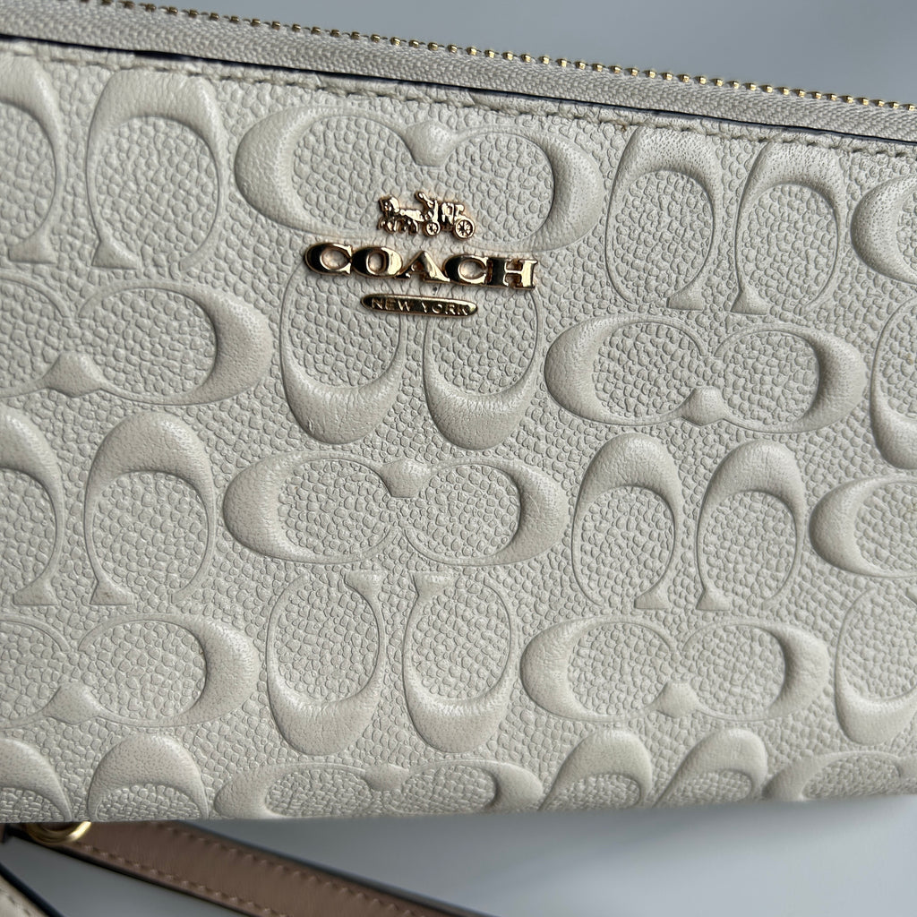 Coach Signature Embossed Chalk White Pebbled Leather Wristlet Excellent