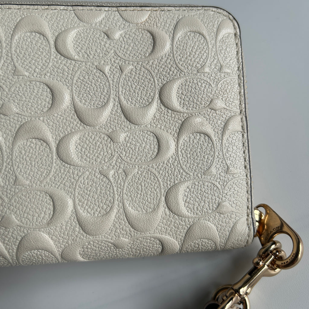 Coach Signature Embossed Chalk White Pebbled Leather Wristlet Excellent