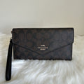 Coach C1962 Travel Envelope Wallet Brown Black Signature Canvas NWT