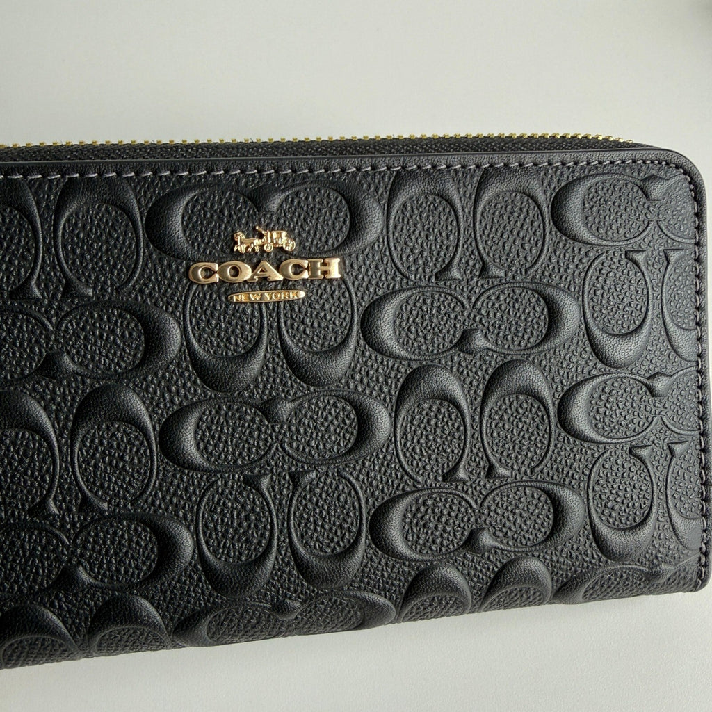 Coach Long Zip Around Black Signature Embossed Leather Wallet CEW21