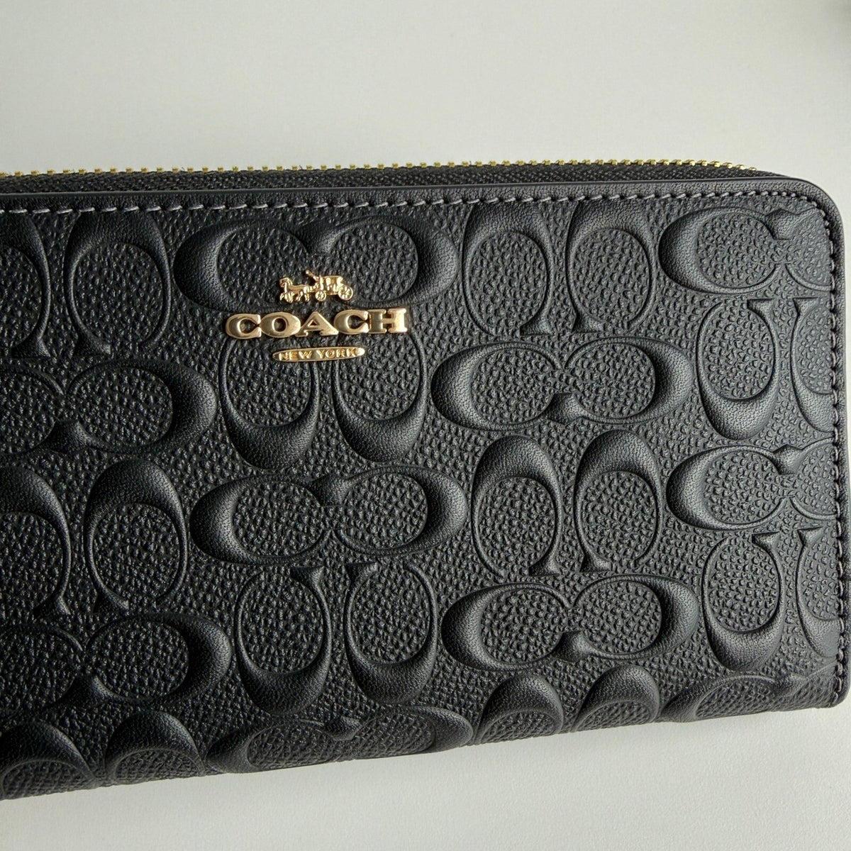 Coach Long Zip Around Black Signature Embossed Leather Wallet CEW21